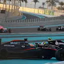 Pastor Maldonado (VEN) Lotus E23 Hybrid and Fernando Alonso (ESP) McLaren MP4-30 collide at the start of the race at Formula One World Championship, Rd19, Abu Dhabi Grand Prix, Race, Yas Marina Circuit, Abu Dhabi, UAE, Sunday 29 November 2015. &copy; Sutton Motorsport Images